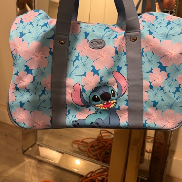 Disney Handbags - Disney Stitch Floral Travel Bag - Blue and Pink